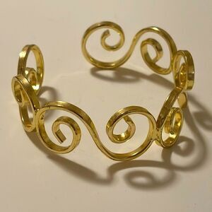 Vintage gold tone wide scroll cuff bracelet